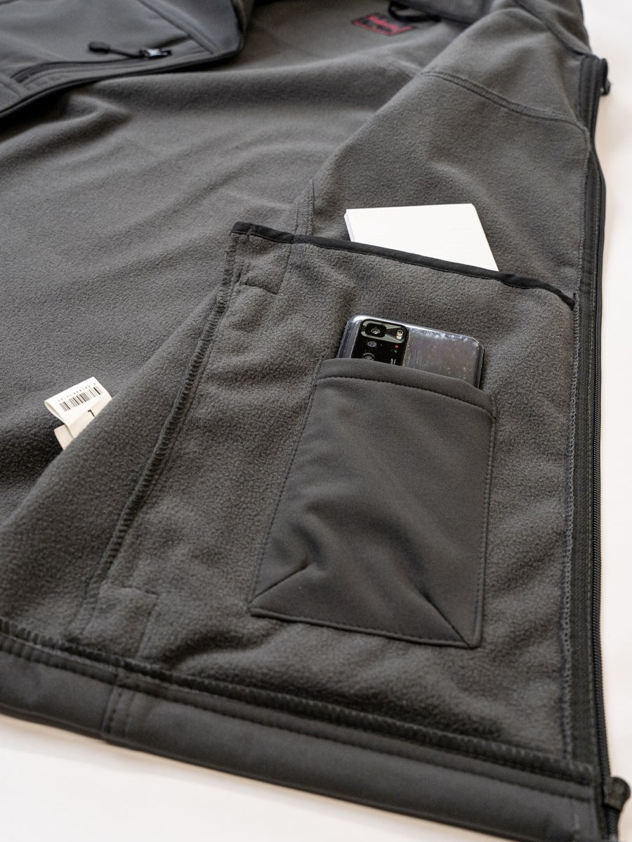 Softshell-Weste mit verdeckter Innentasche und seitlichem Reißverschlussfach