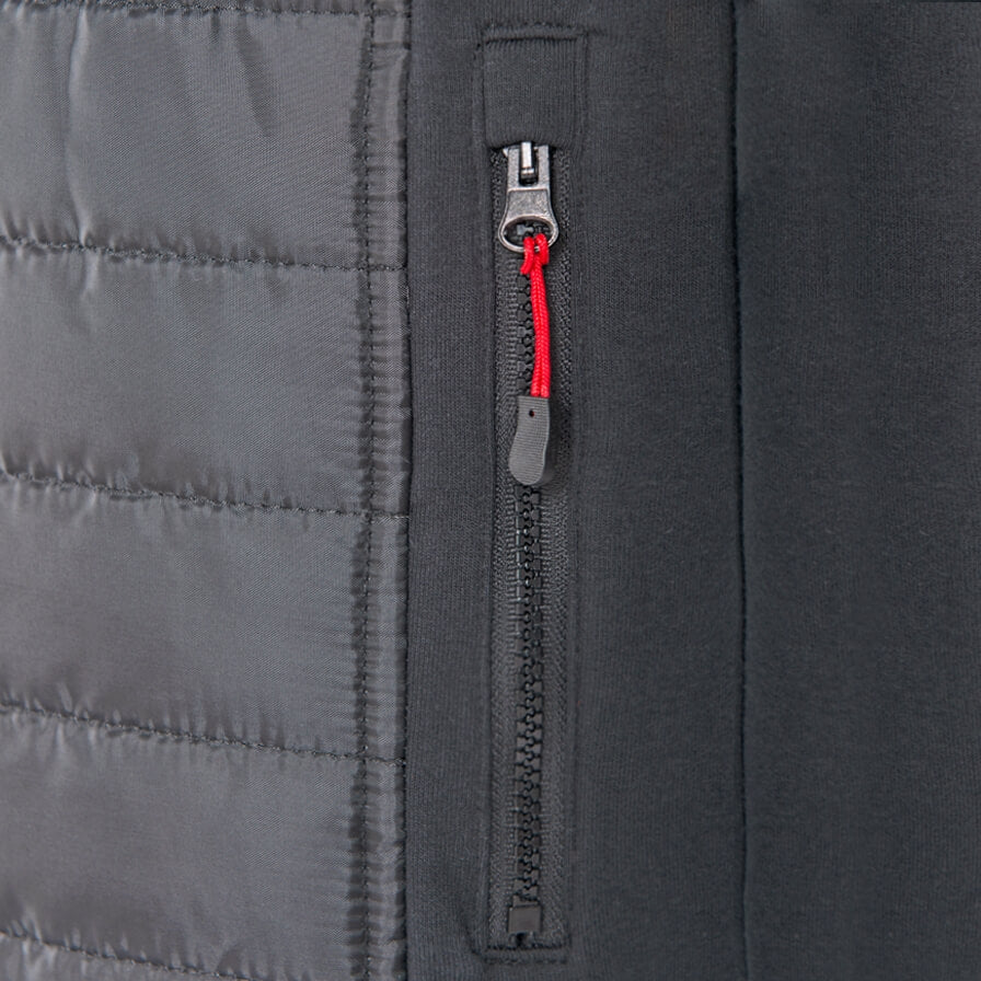 Reißverschluss der Thermojacke mit rotem Schieber und grauer Ummantelung