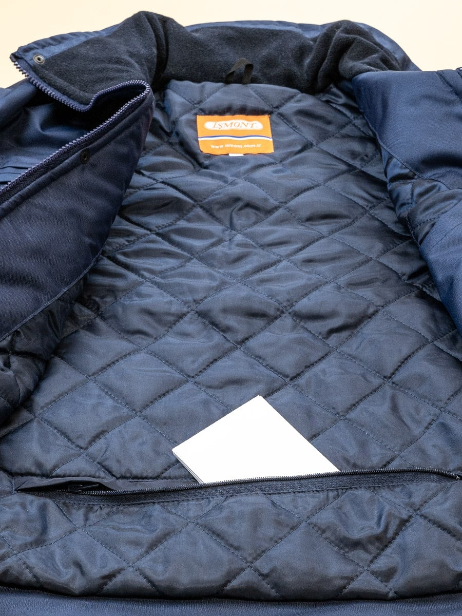 Marineblaue Jacke mit wattiertem Steppfutter und gestepptem Innenbereich
